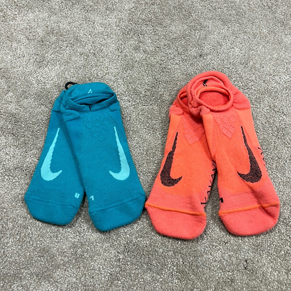 Two pair of new Cushioned Nike Socks Mens Size Large. Teal and orange colorway.
